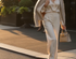 The Classic Ivory Pleated Trousers